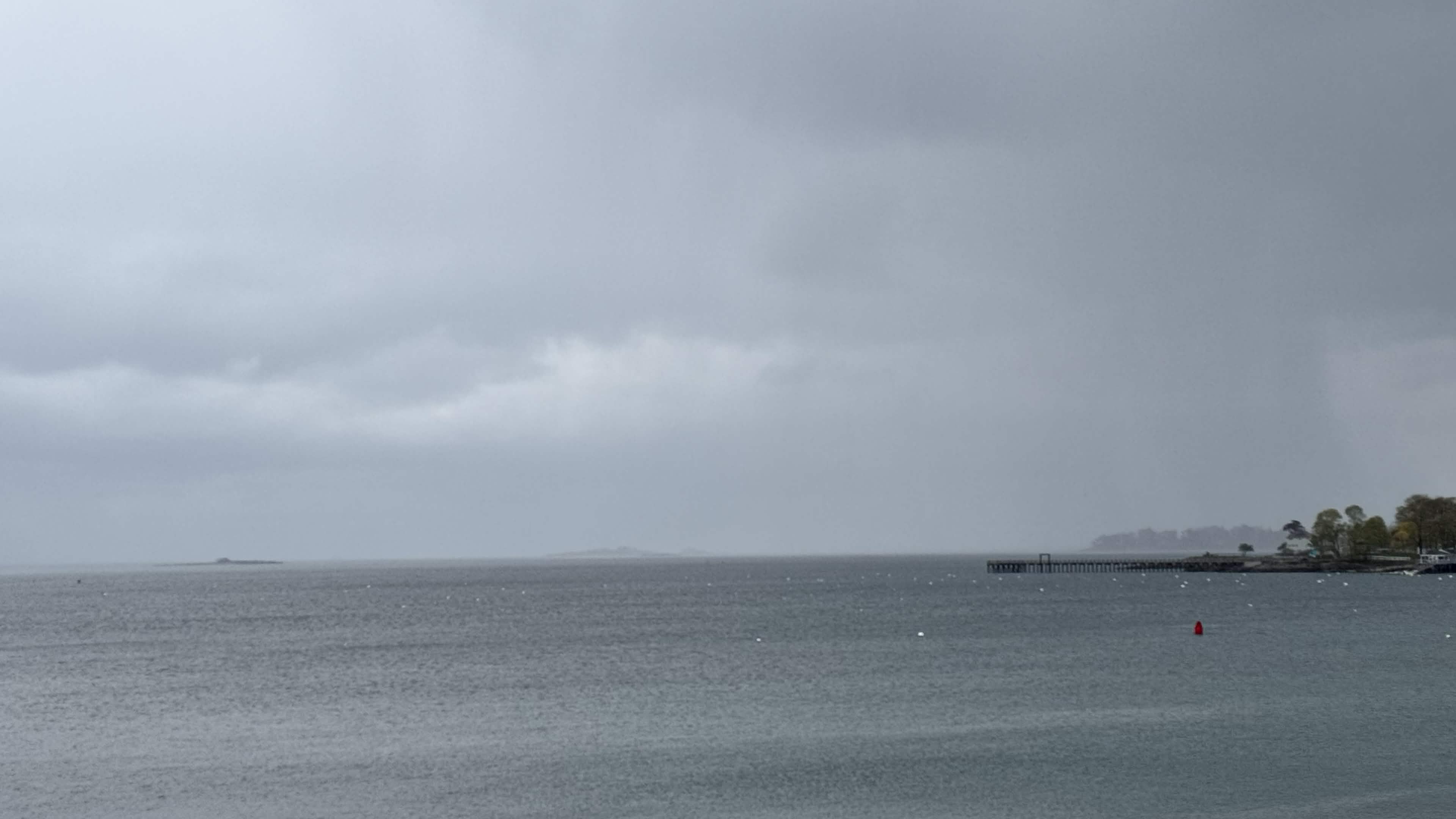 Storm over water — a vast, gray seascape under a heavy sky
